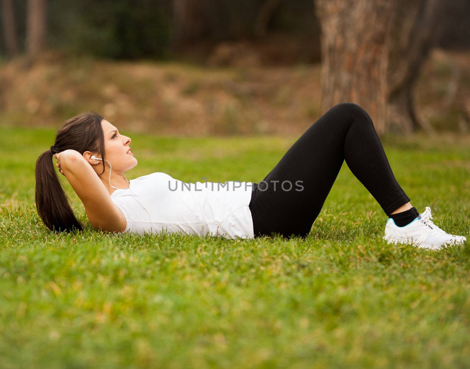 young beautiful latin woman making abs by Lcrespi