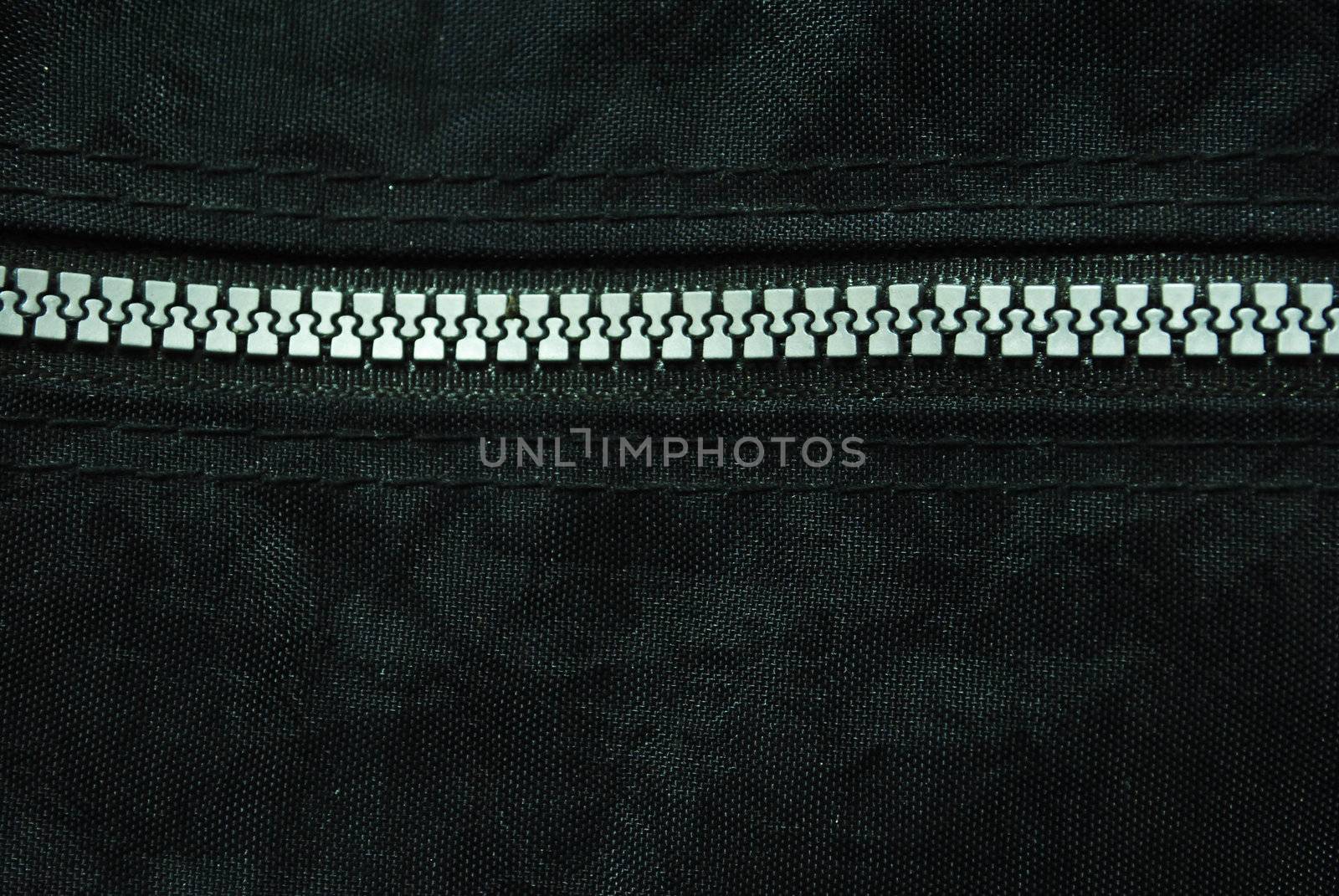 Zipper on black background.