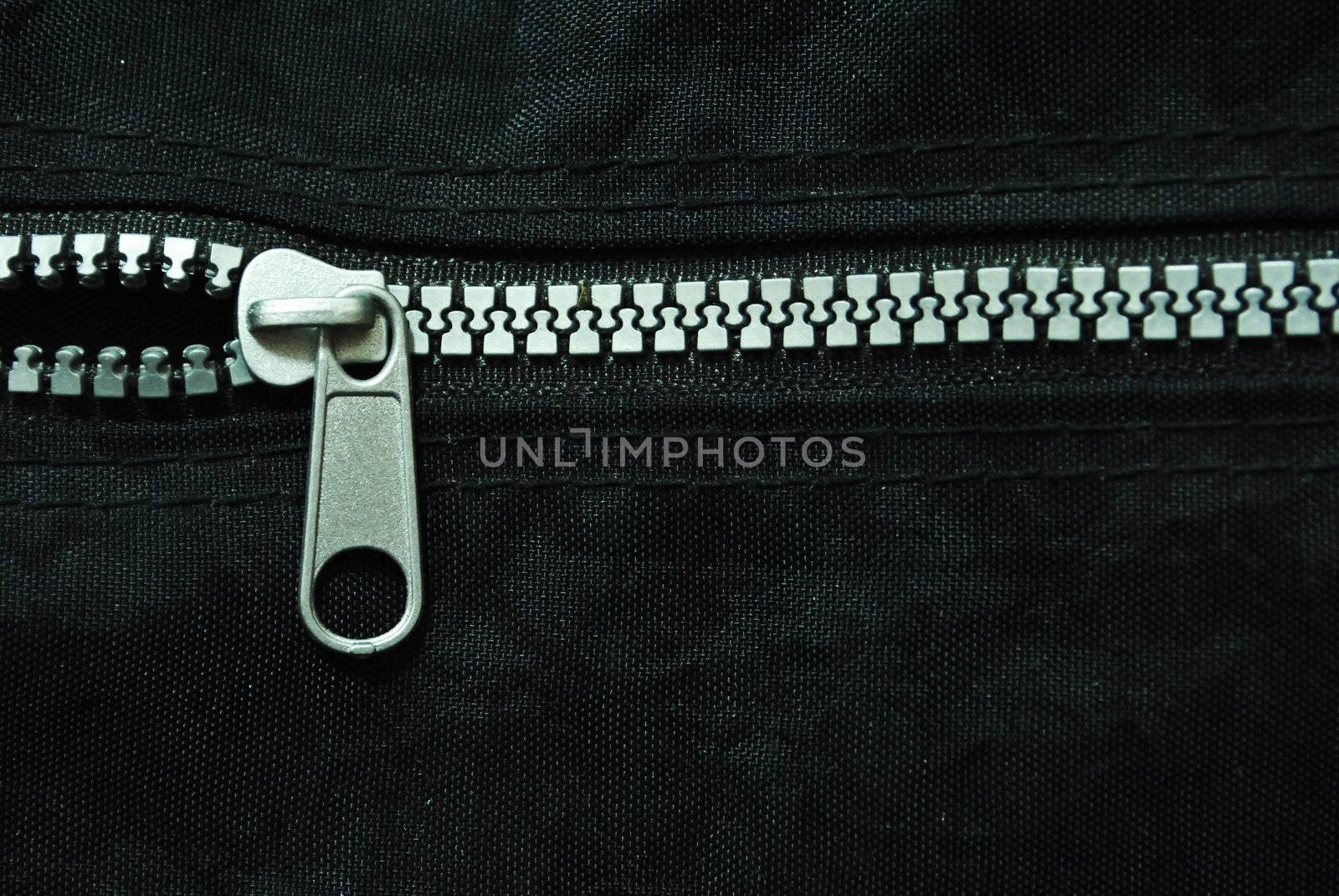 Zipper on black background.