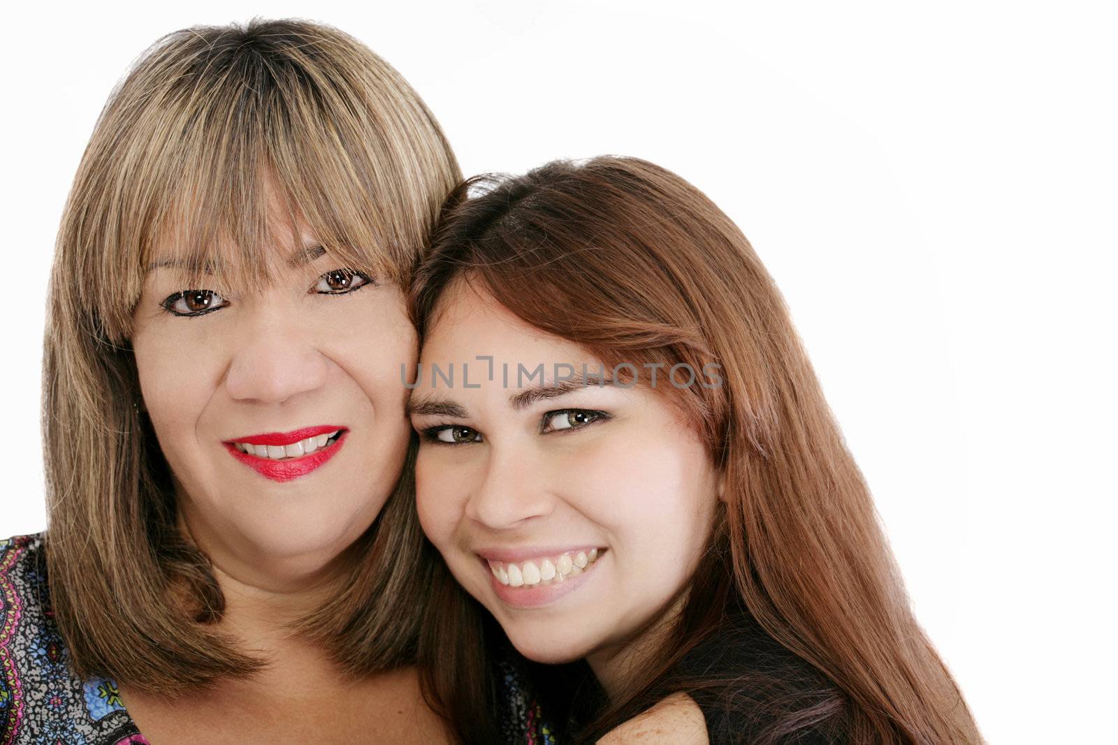 Mother with her daughter looking at the camera