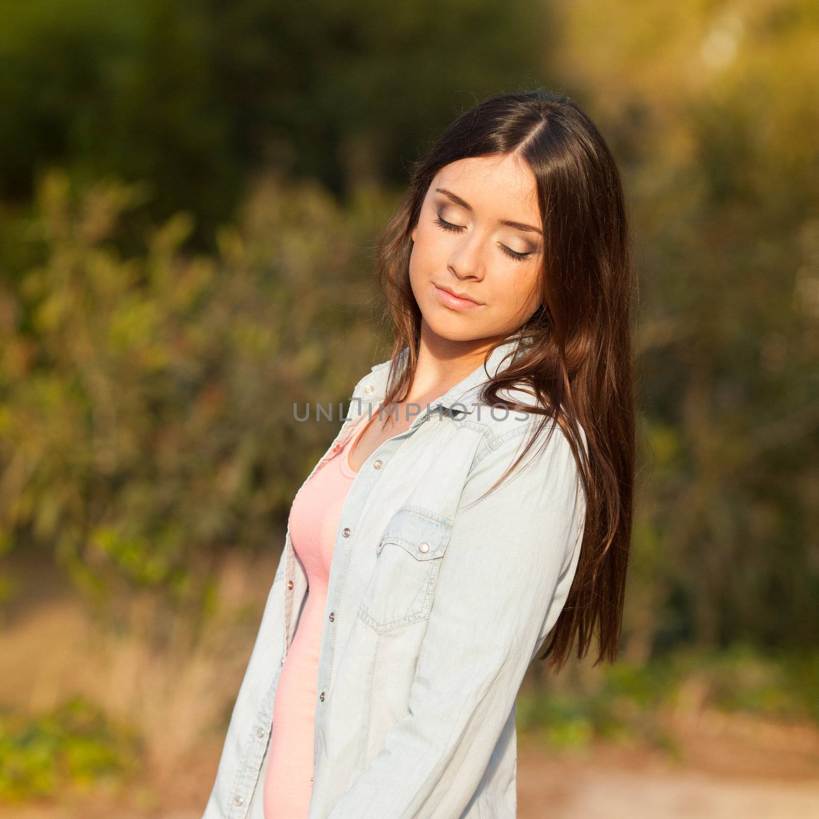 young beautiful young woman portrait on sunny day