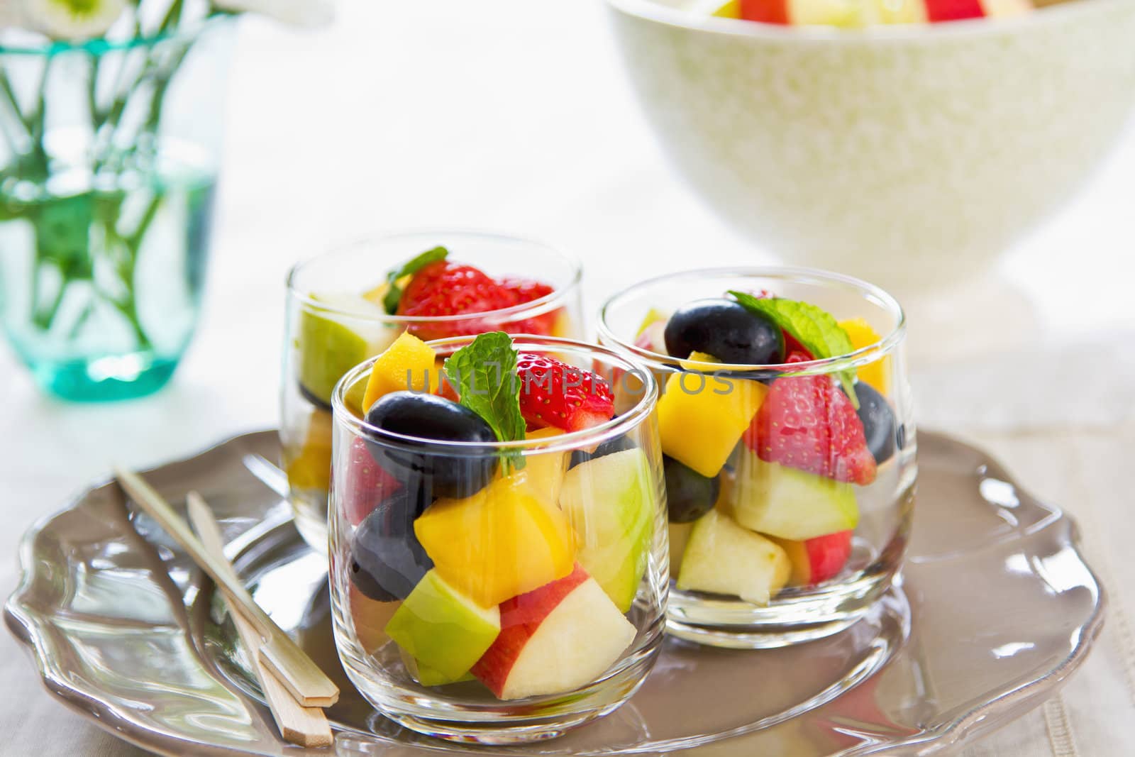 Varieties of fruits salad in small glasses