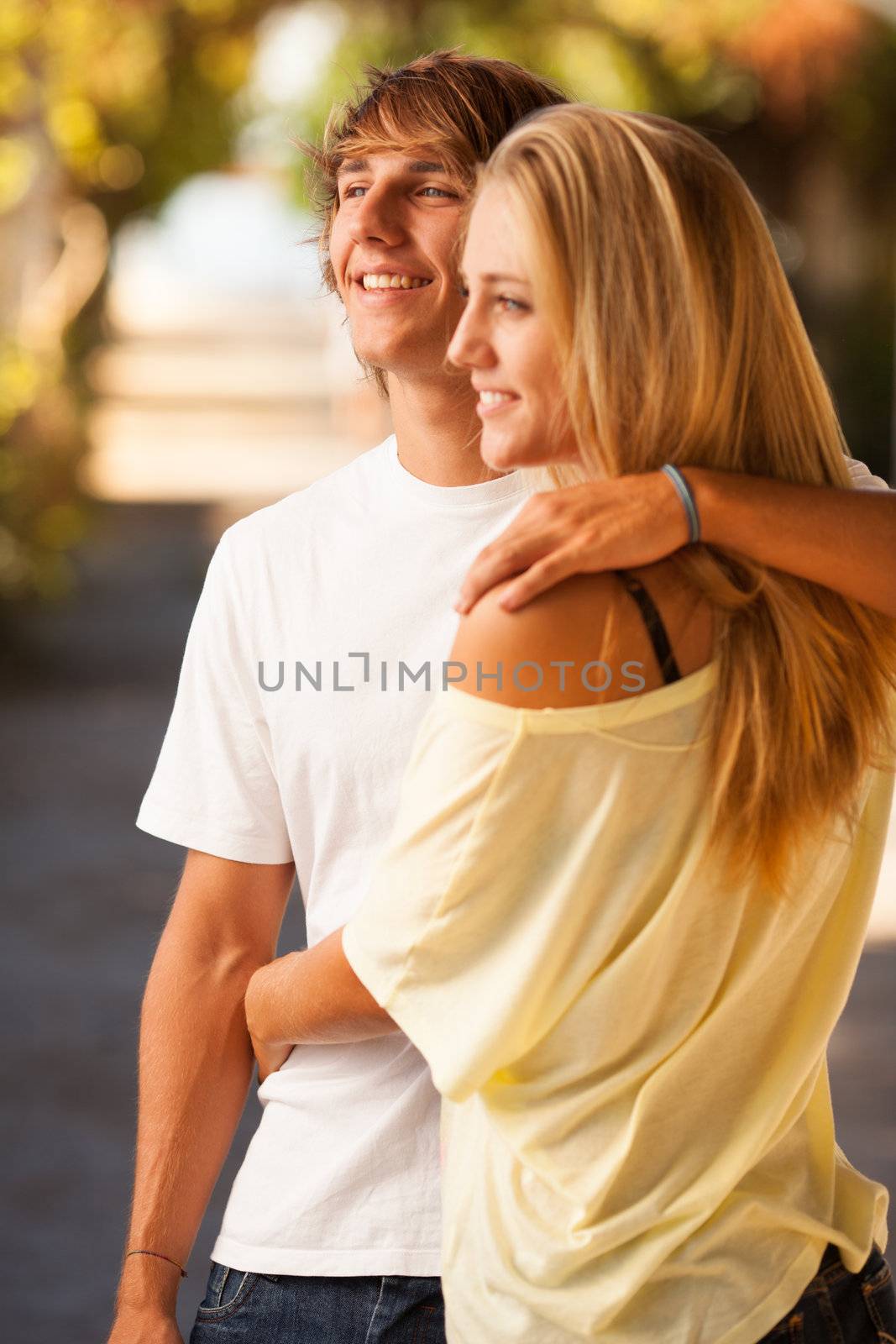 young beautiful couple enjoying a day on the park on summer