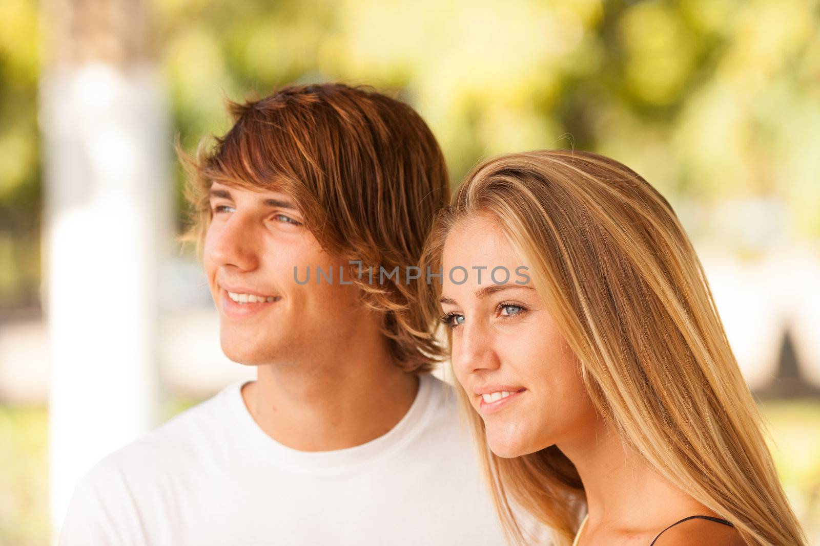 young beautiful couple enjoying a day on the park on summer