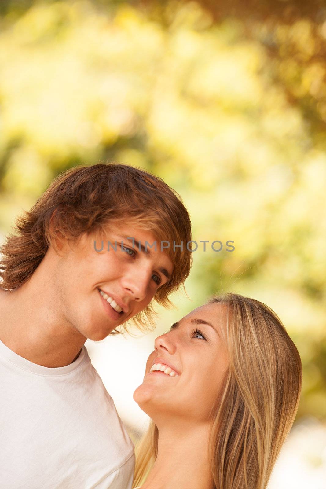 young beautiful couple enjoying a day on the park on summer