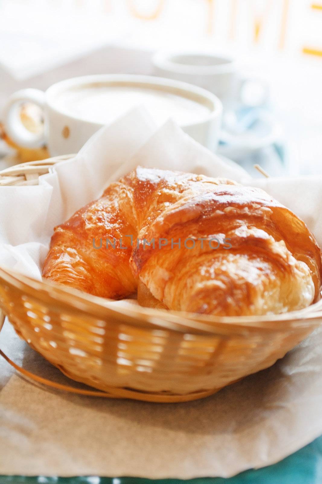 Croissant and a cup of coffee  by shebeko