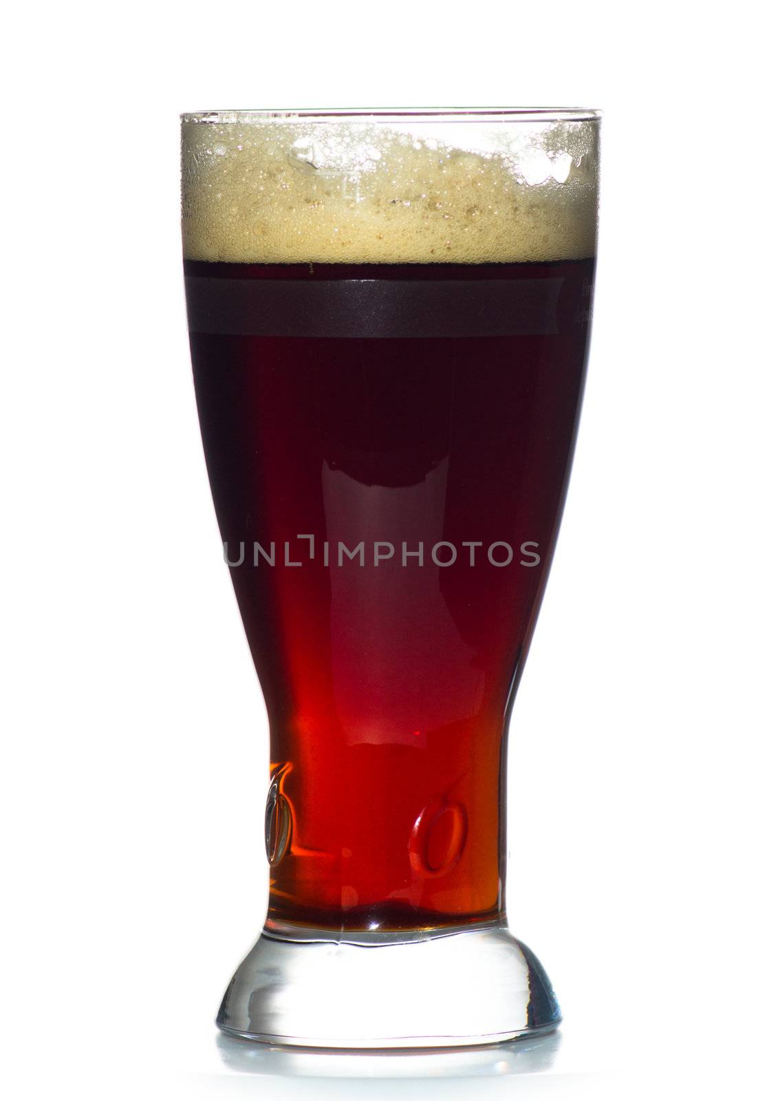 beer glass full of cold red ale. Isolated