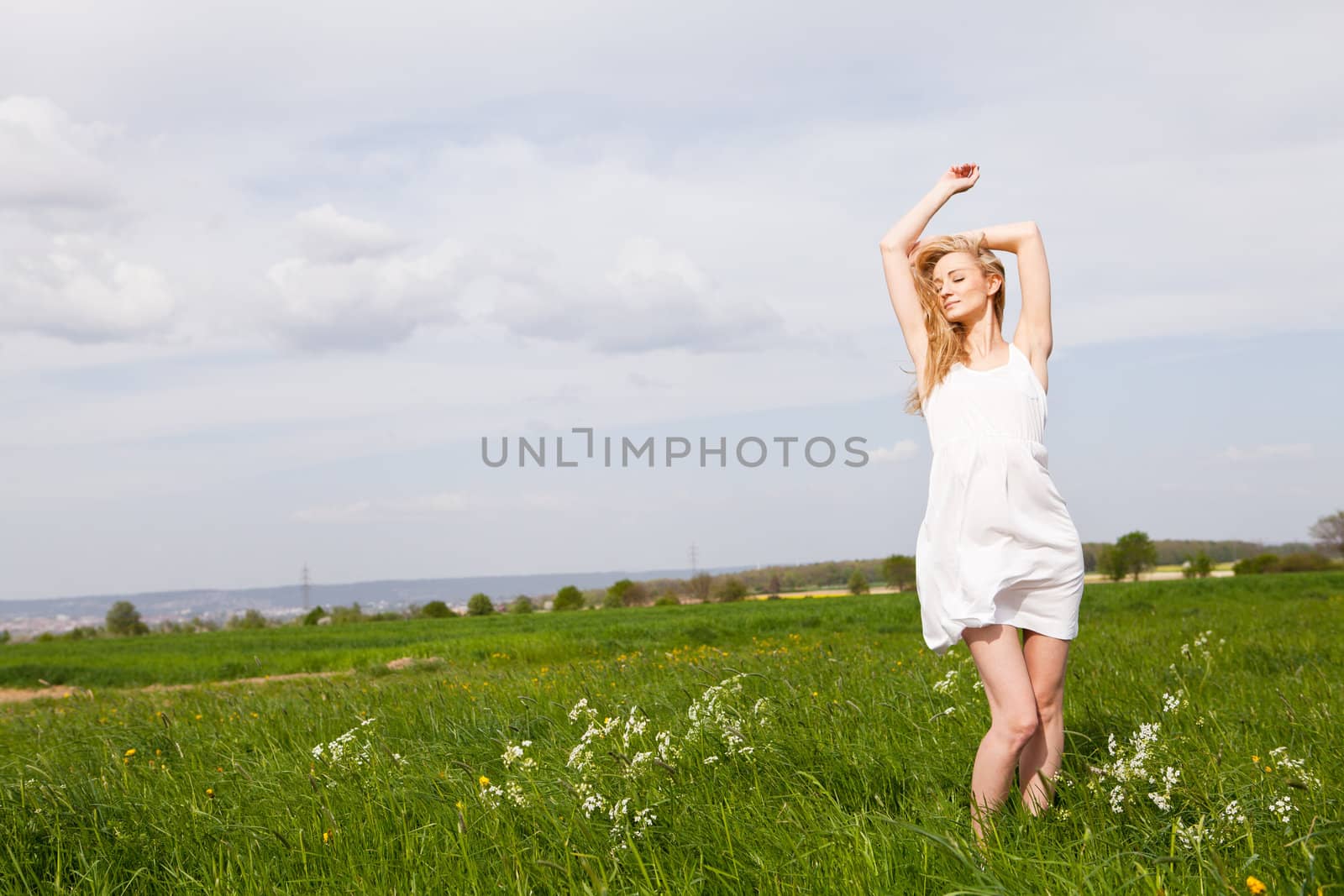 beautiful blonde woman outdoor in summer happy by juniart