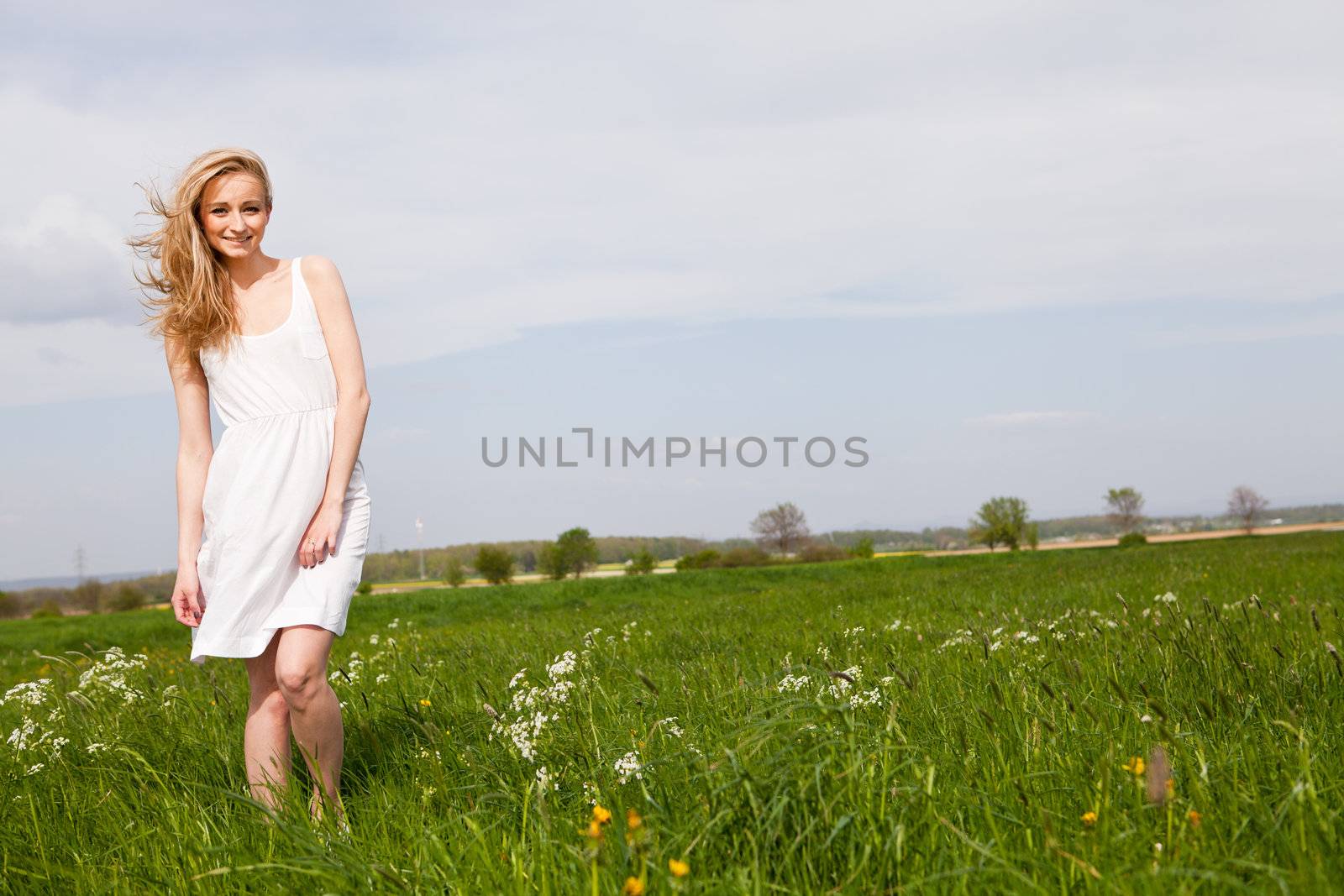 beautiful blonde woman outdoor in summer happy by juniart