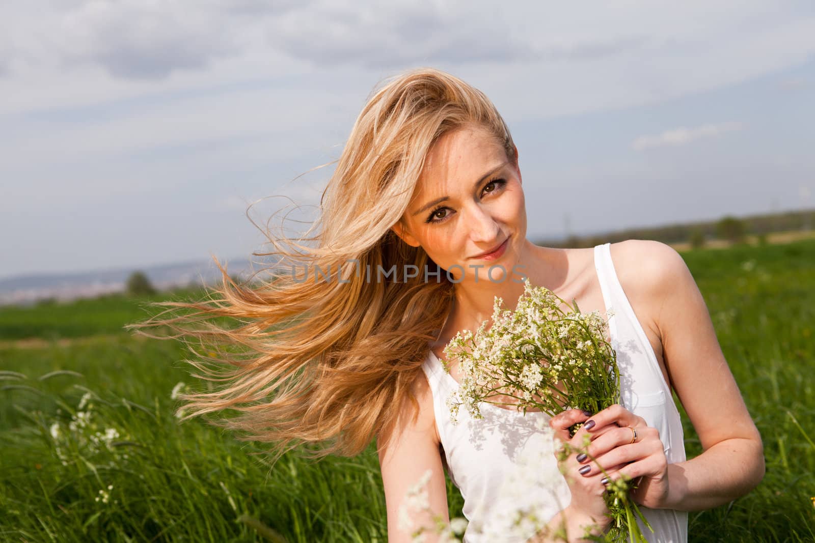 beautiful blonde woman outdoor in summer happy by juniart