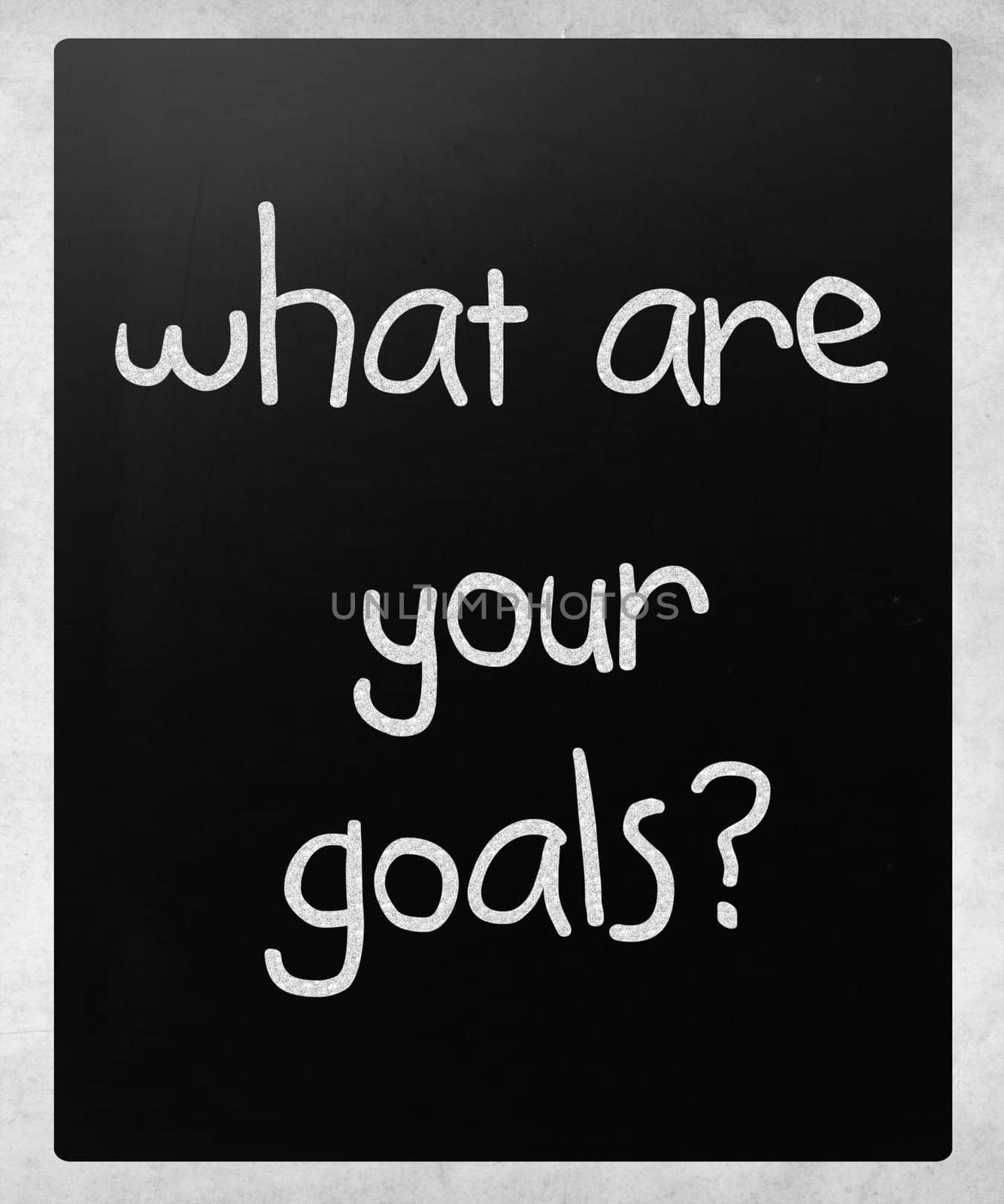 "What are your goals?" handwritten with white chalk on a blackboard