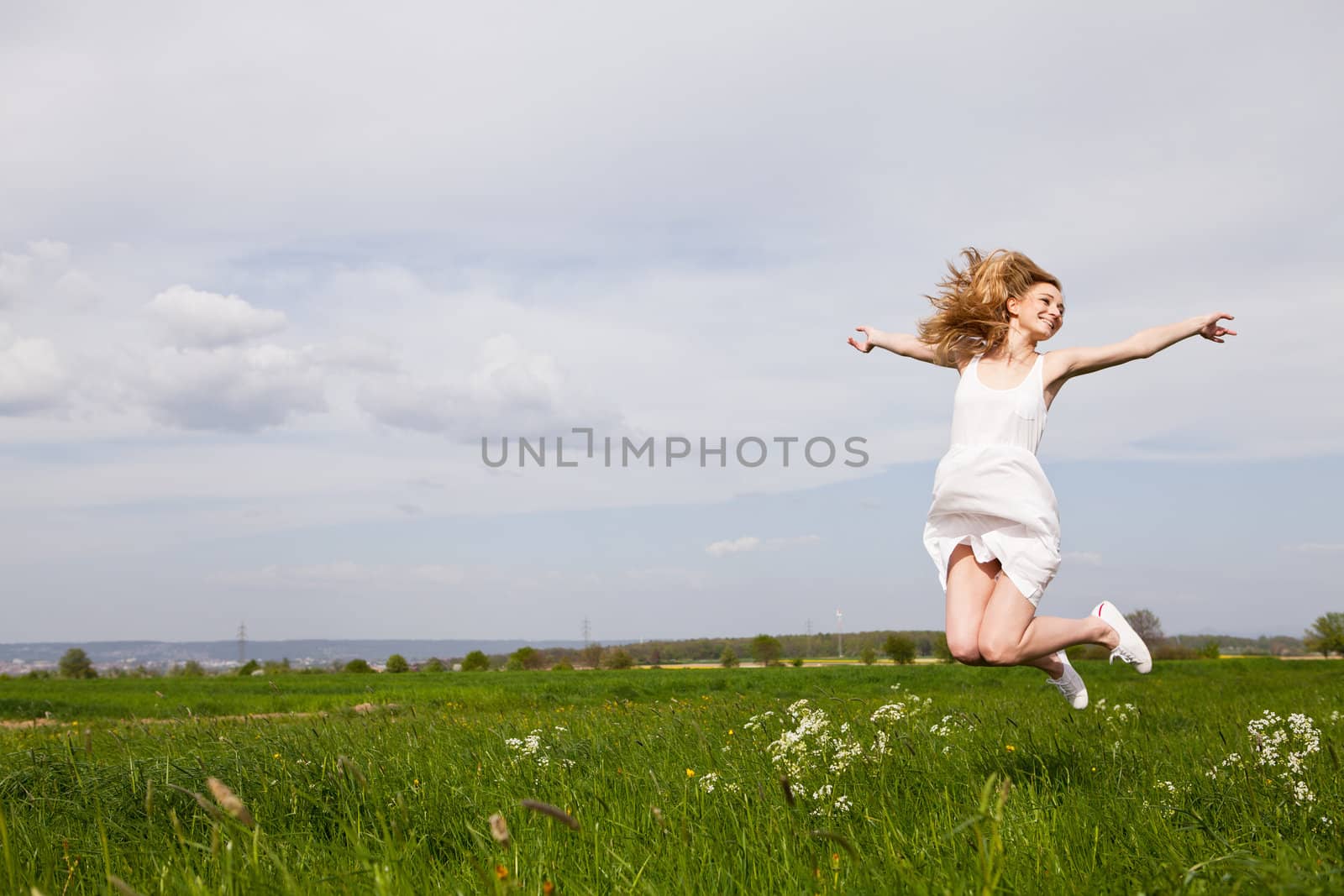 beautiful blonde woman outdoor in summer happy by juniart