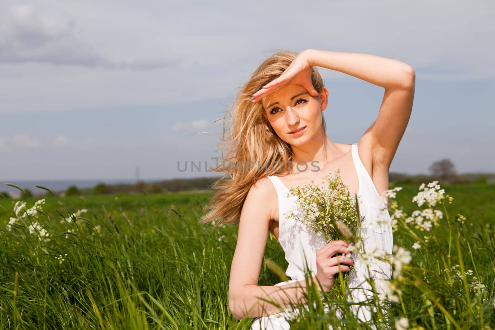 beautiful blonde woman outdoor in summer happy by juniart