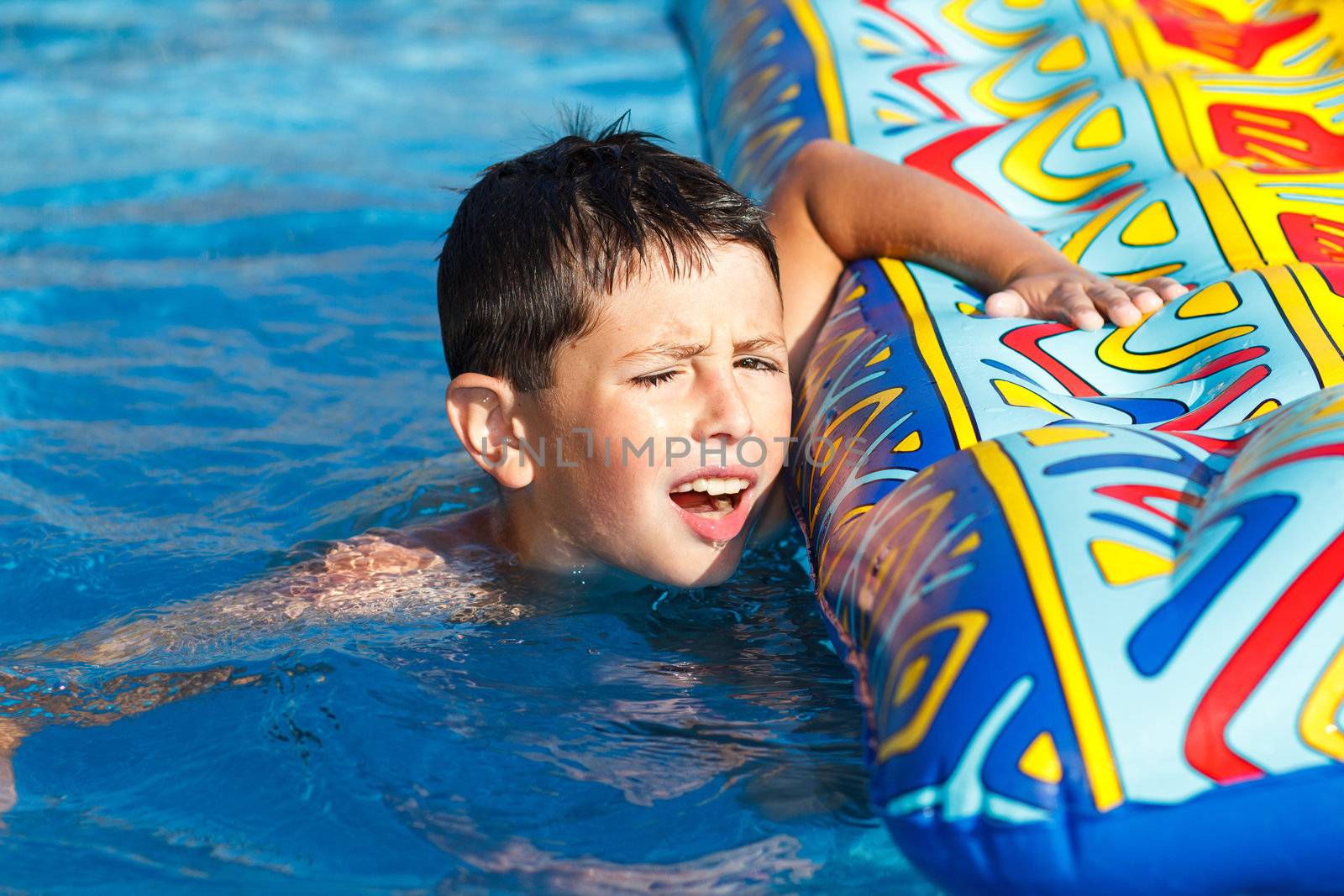 Boy in swimming pool  by artush