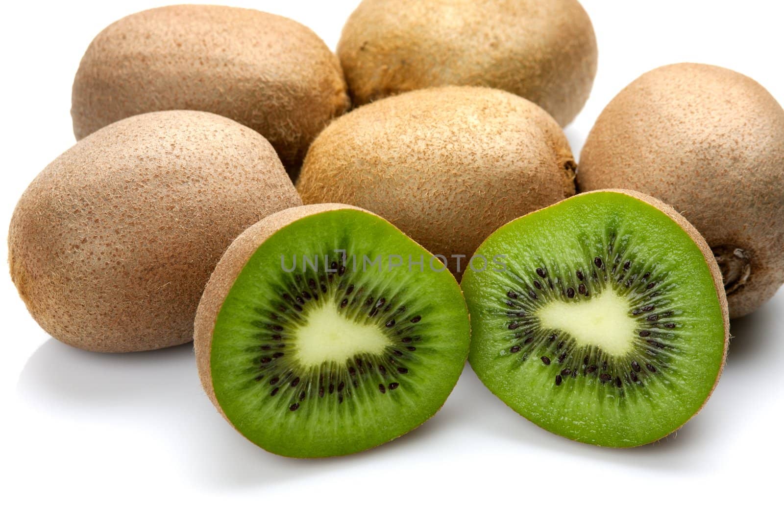 Kiwi fruit isolated on white background by sfinks