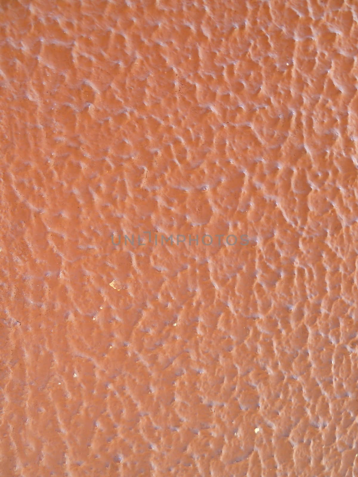 closeup of textured brown paint surface