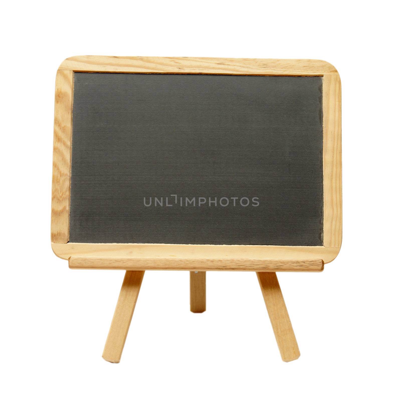 An isolated shot of a blank chalkboard on an easel.