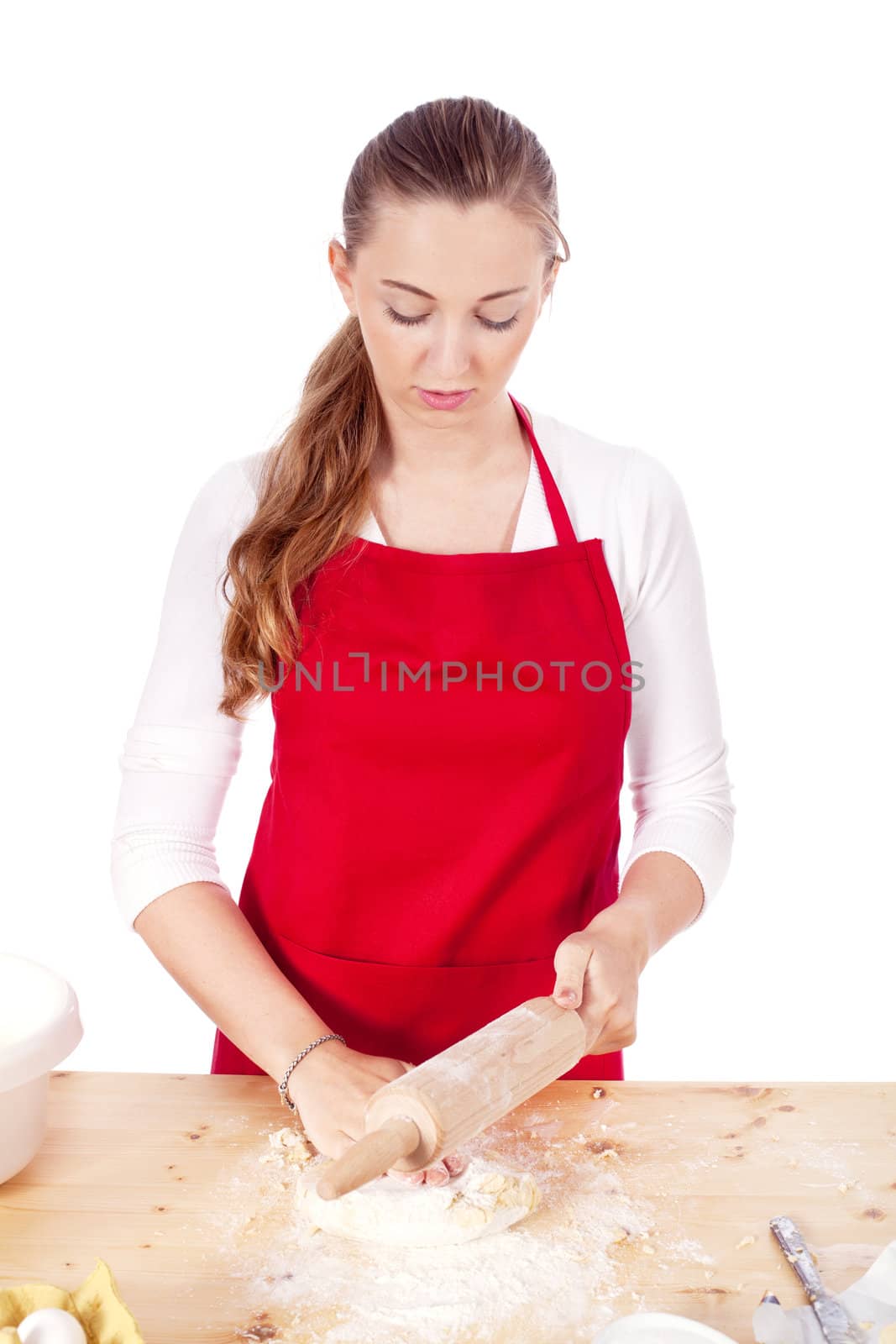 beautiful woman is baking cookies for christmas isolated