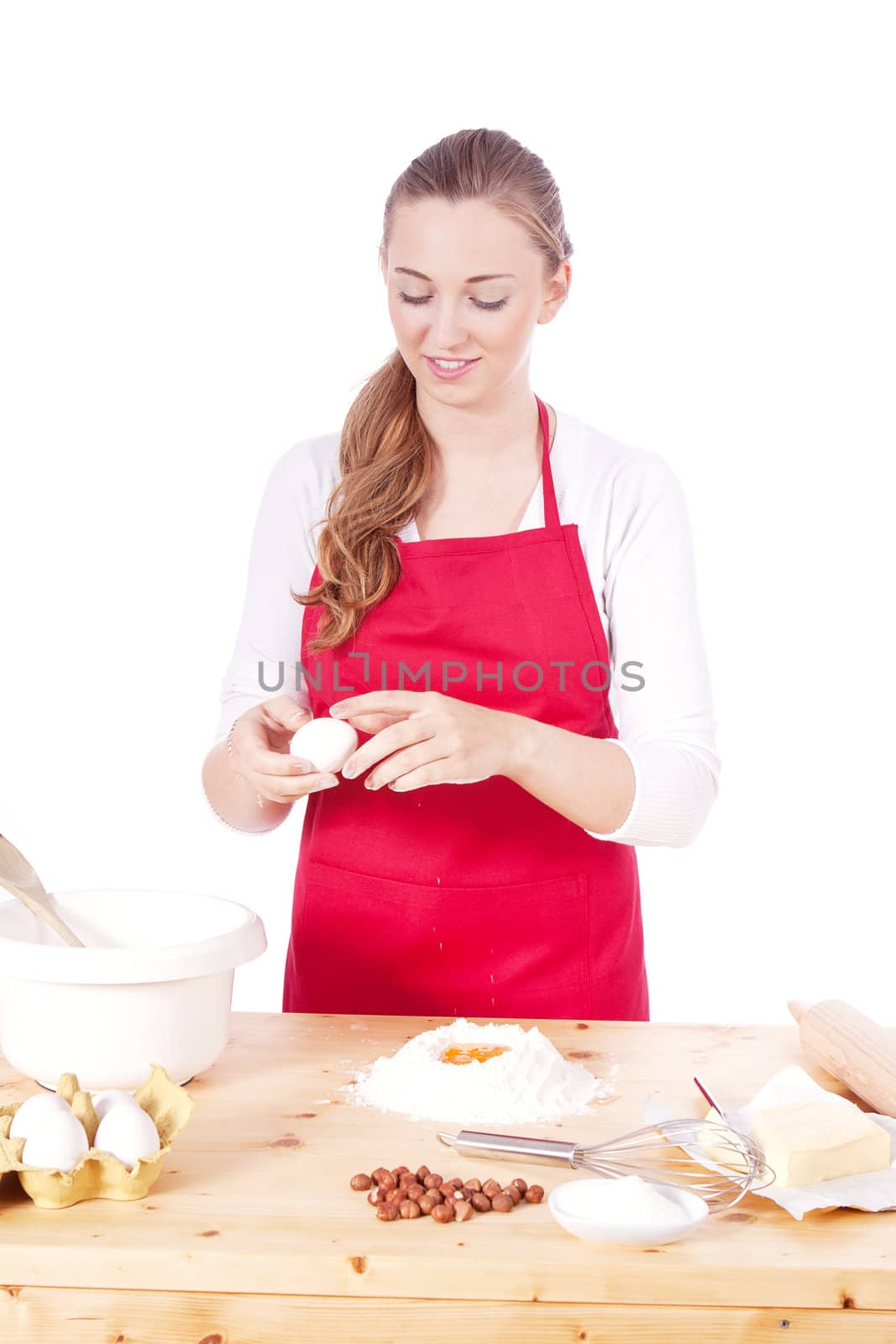 beautiful woman is baking cookies for christmas isolated