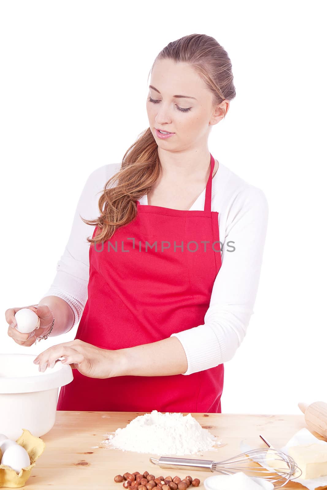 beautiful woman is baking cookies for christmas isolated