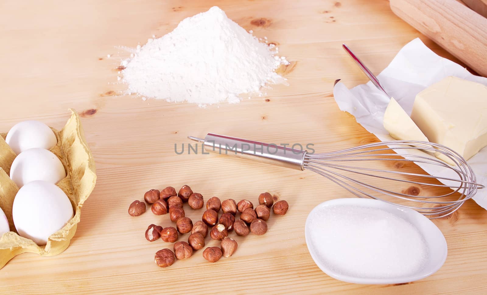 different ingredients for baking on wooden table