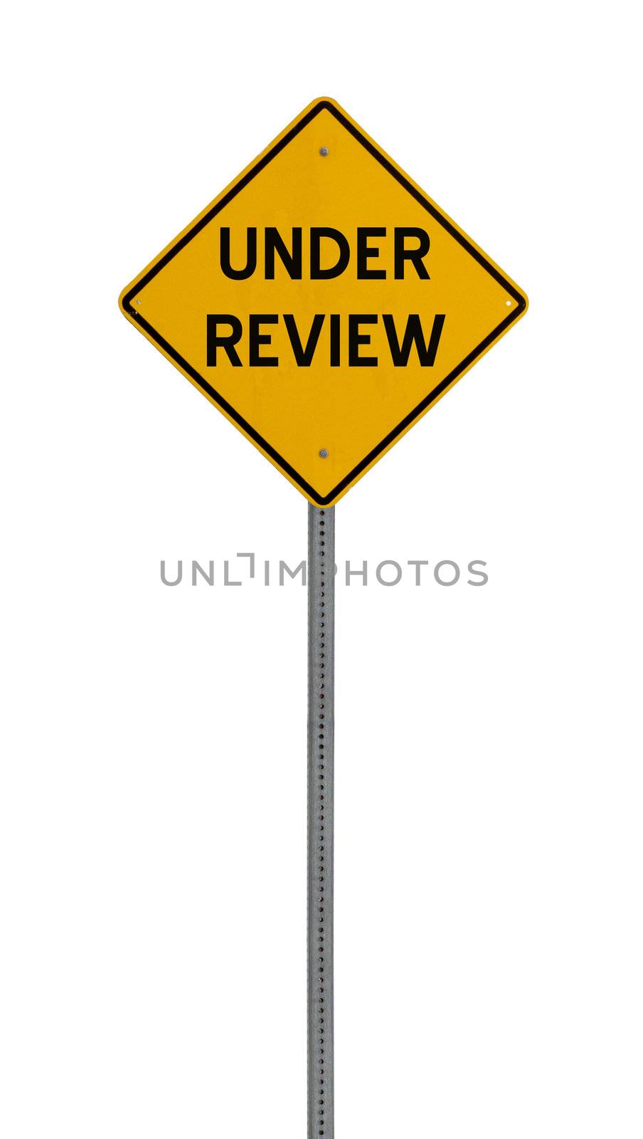 under review - Yellow road warning sign by jeremywhat