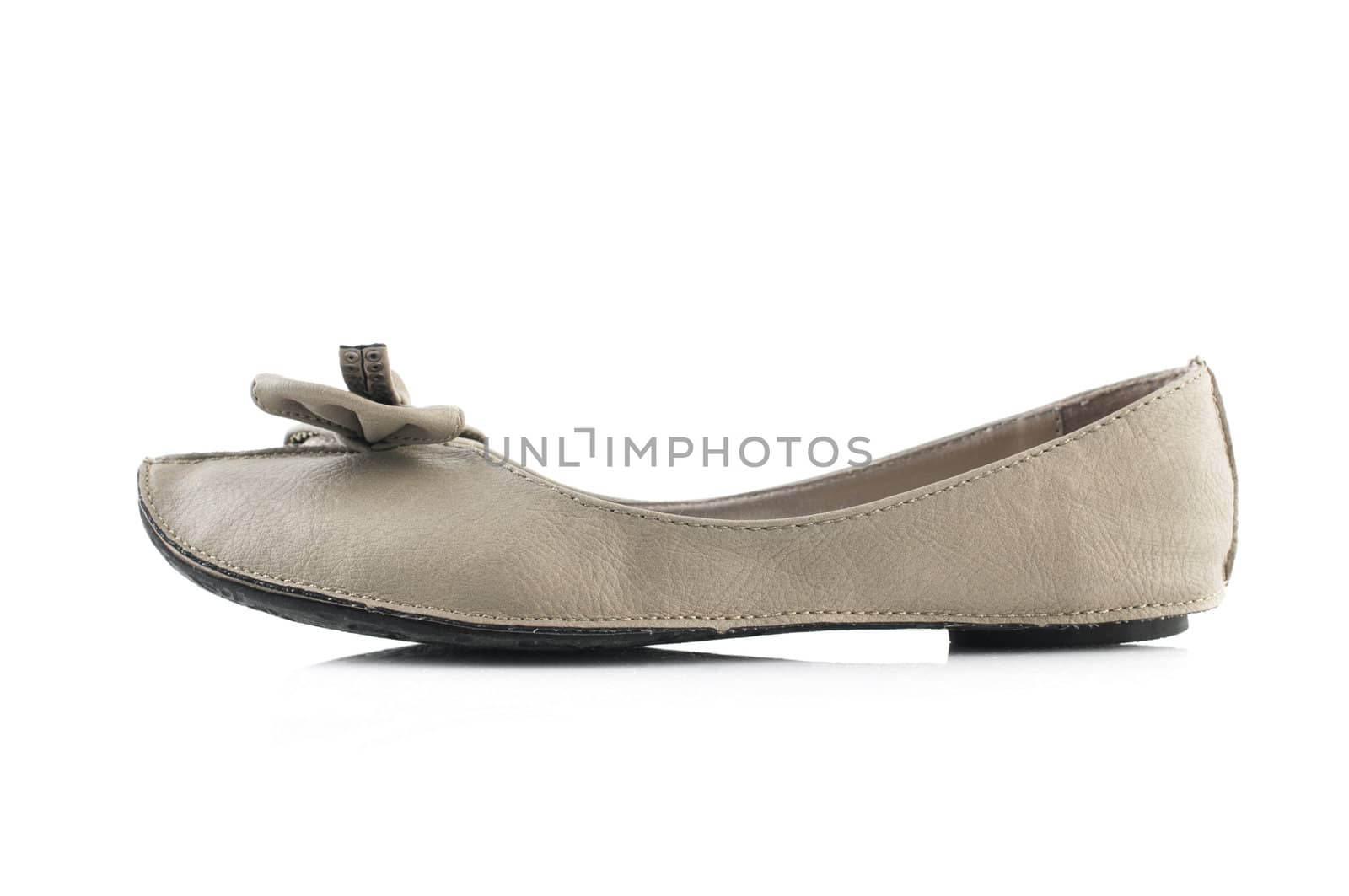 Single woman flat shoe on white background
