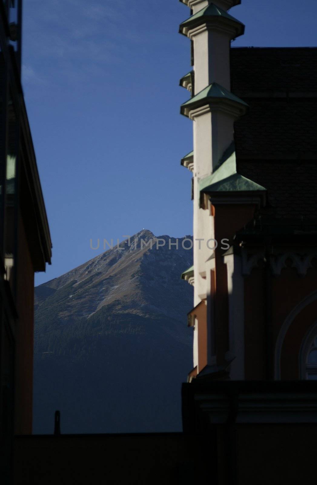 View from Innsbruck between two houses on the Nordkette
