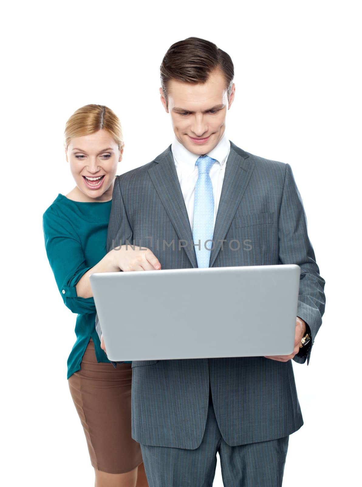 Smiling business people using laptop isolated against white background