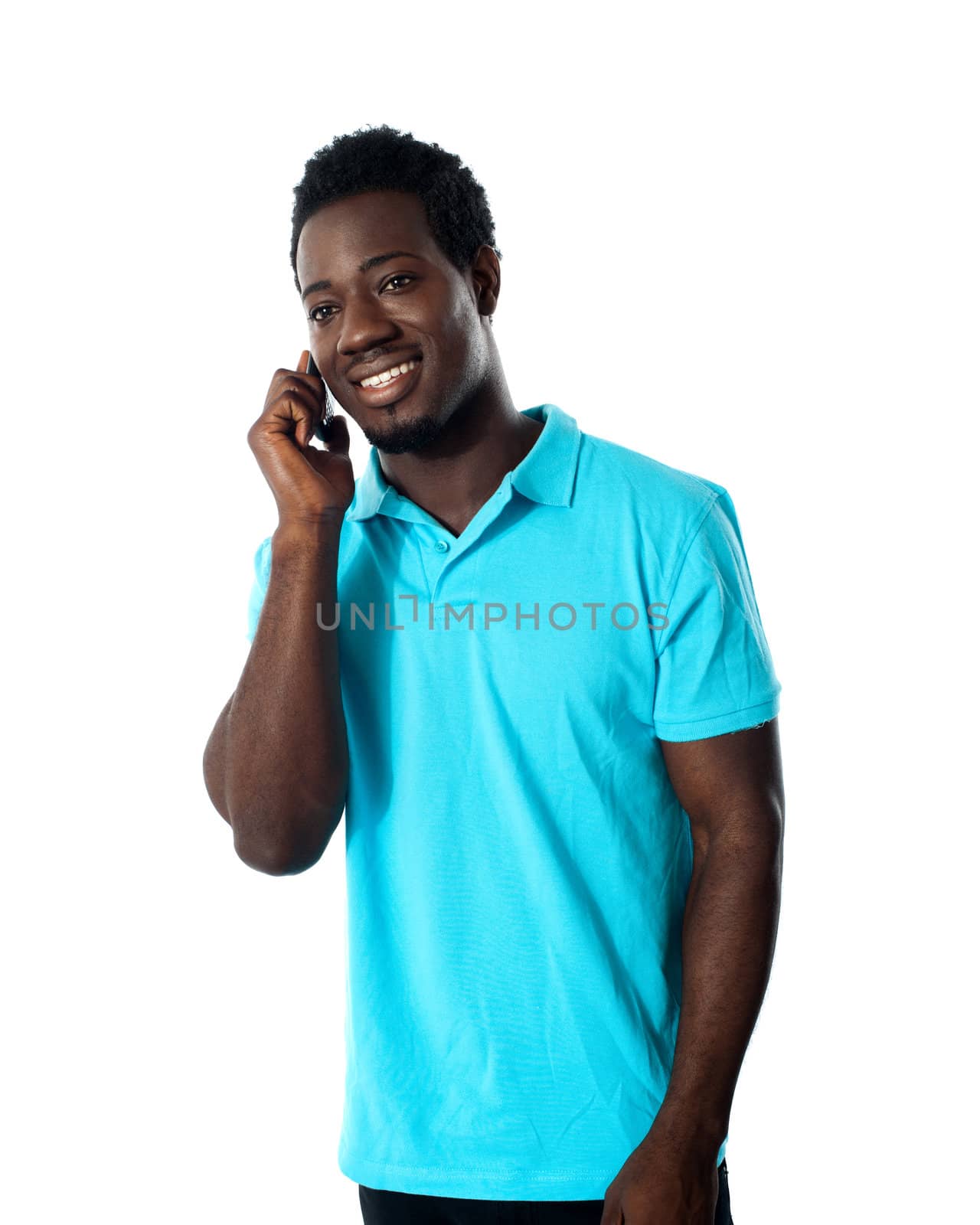 Casual young guy communicating and looking away