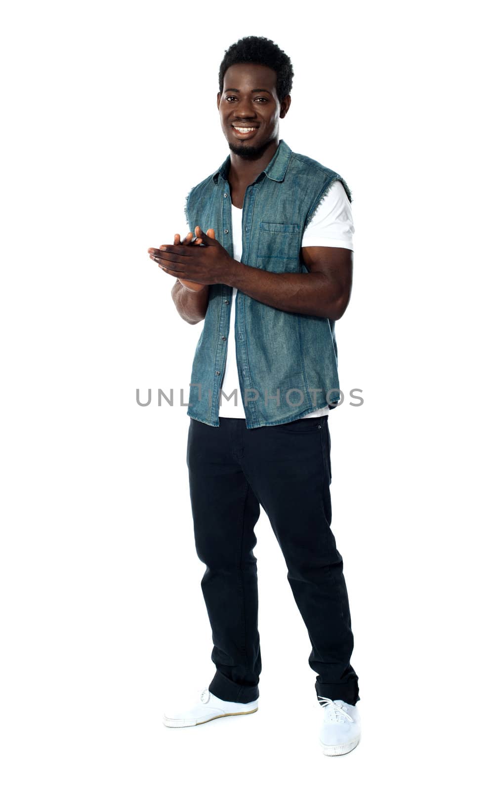 Full length portrait of casual handsome guy isolated on white background