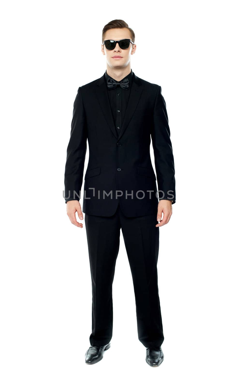 Full length portrait of young man wearing goggles. Posing in style