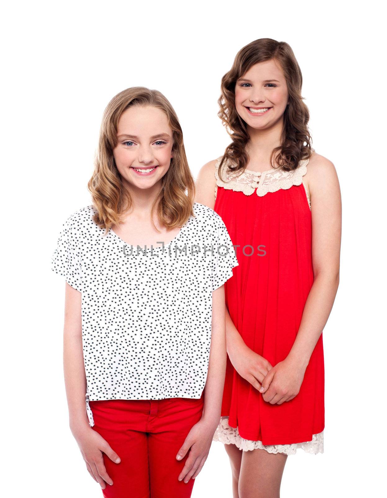 Lovely girls wearing beautiful trendy dresses isolated over white background