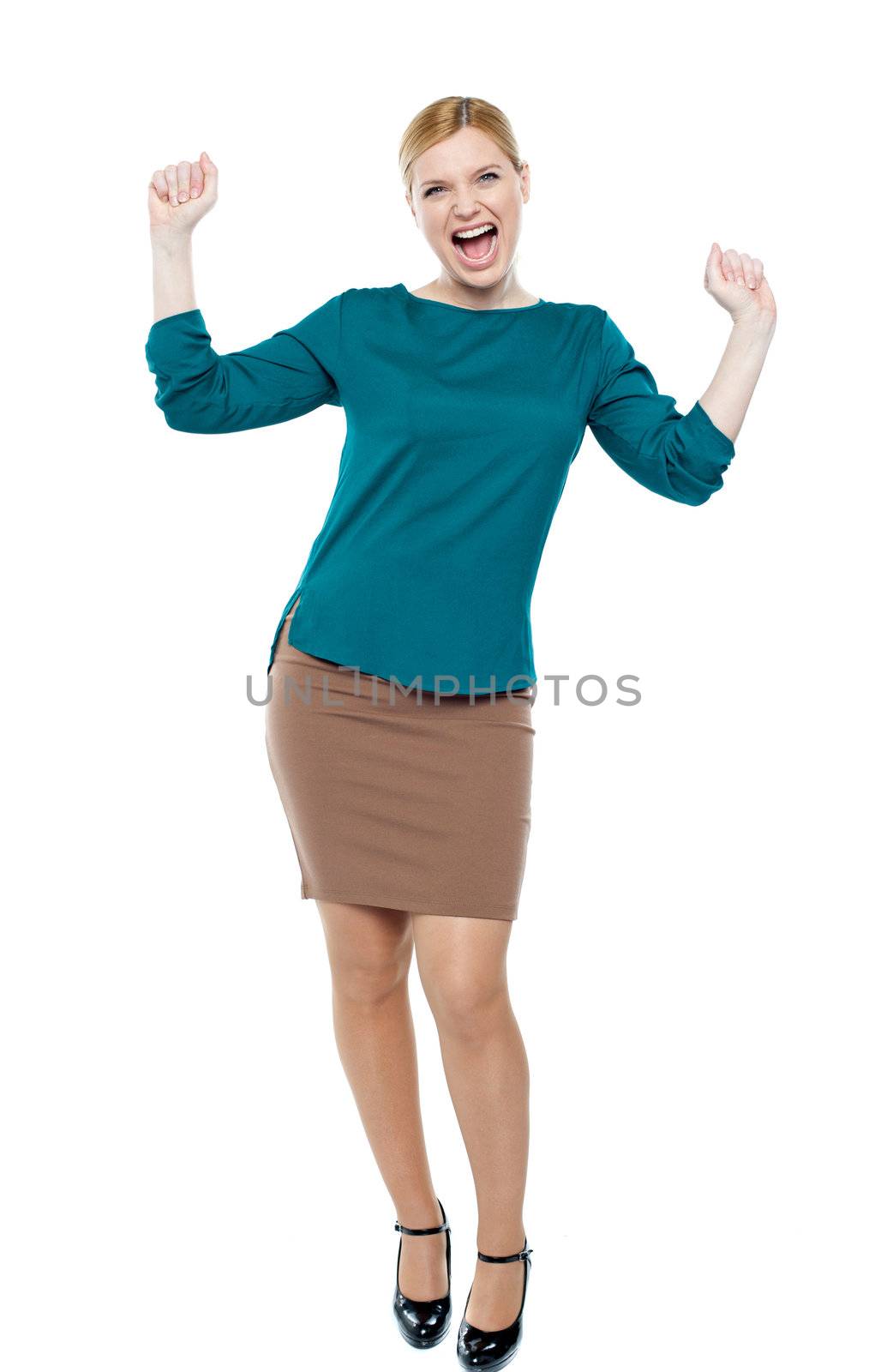 Excited businesswoman celebrating success isolated against white background