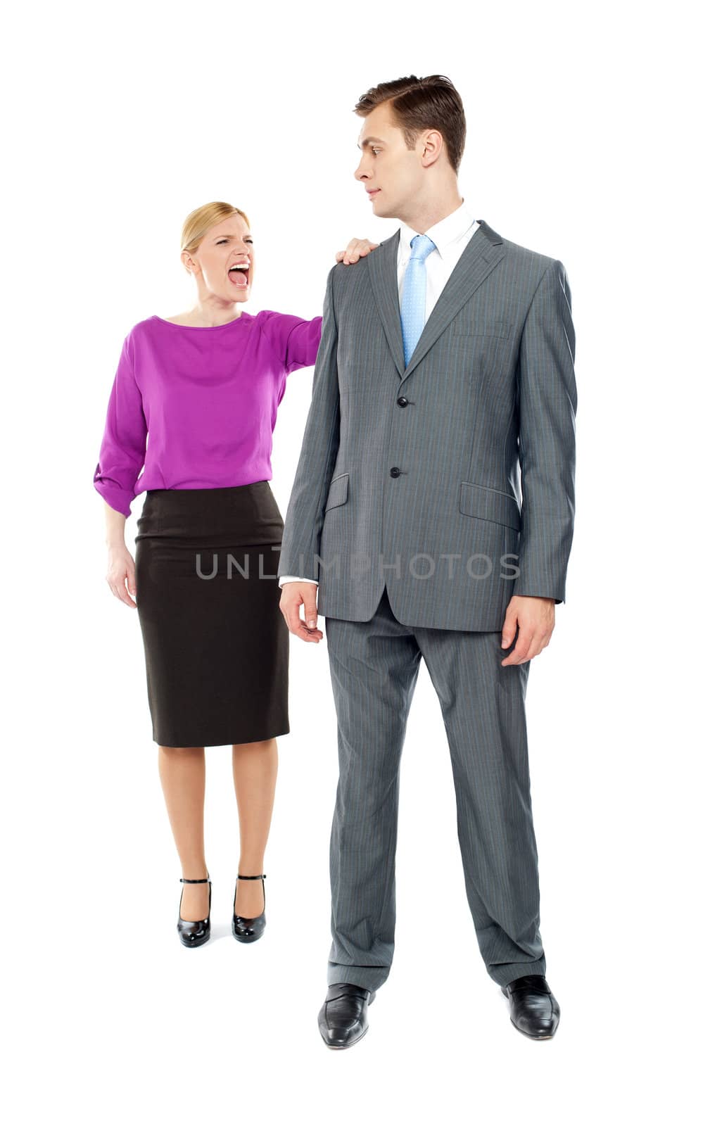 Female secretary shouting on her co-worker. Holding him by his shoulders