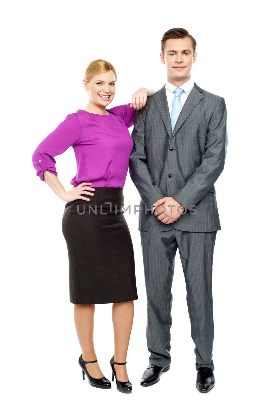 Business team members posing together by stockyimages