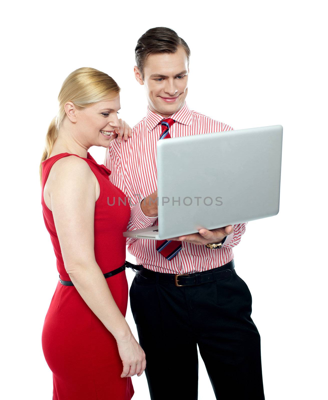 Office workers holding a laptop against a white background