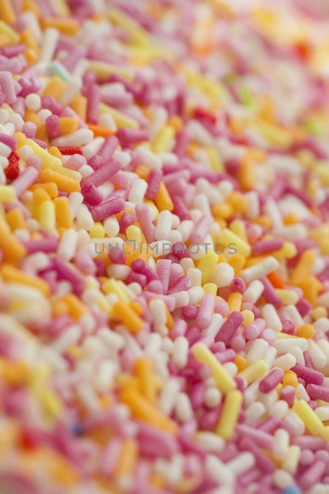 Sugar sprinkles as a background. Soft focus.