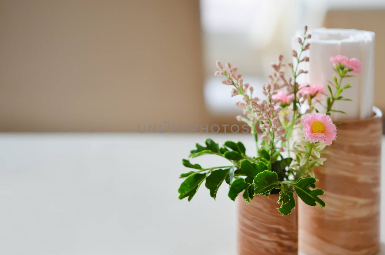 set up flowers at  table in restaurant