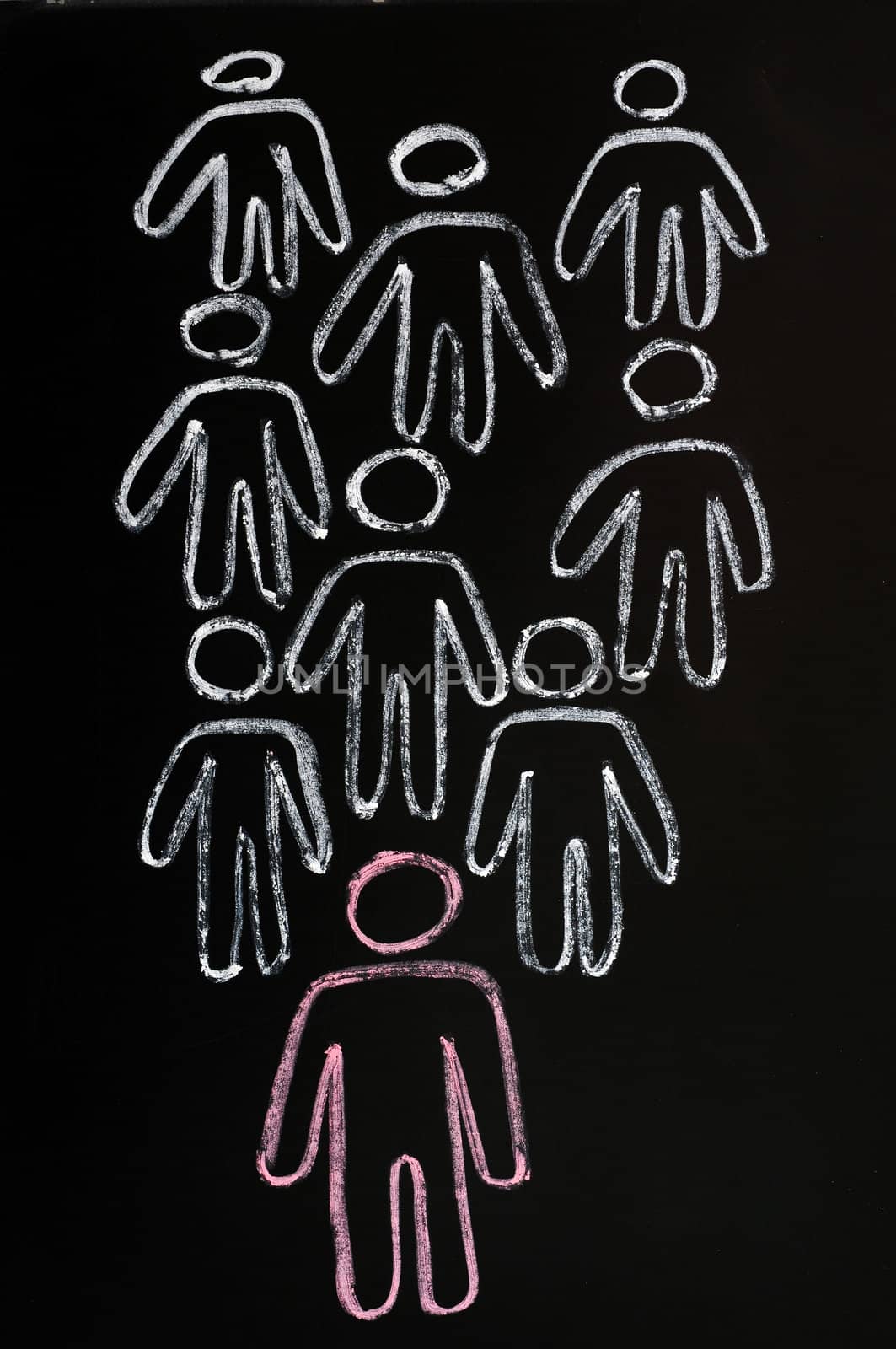 Working together team concept on a blackboard background