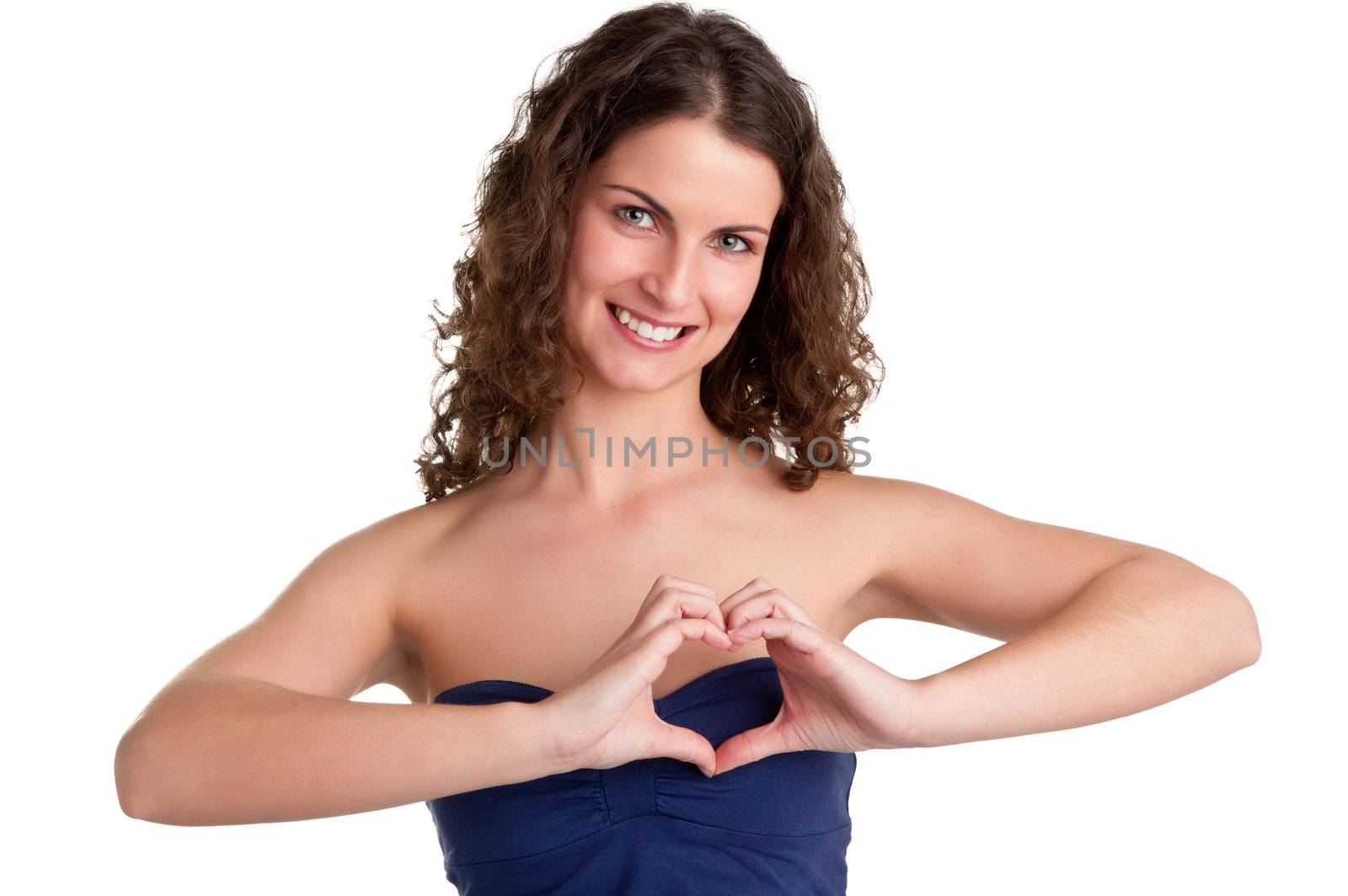 Woman making a heart symbol with her hands, isolated in a white background