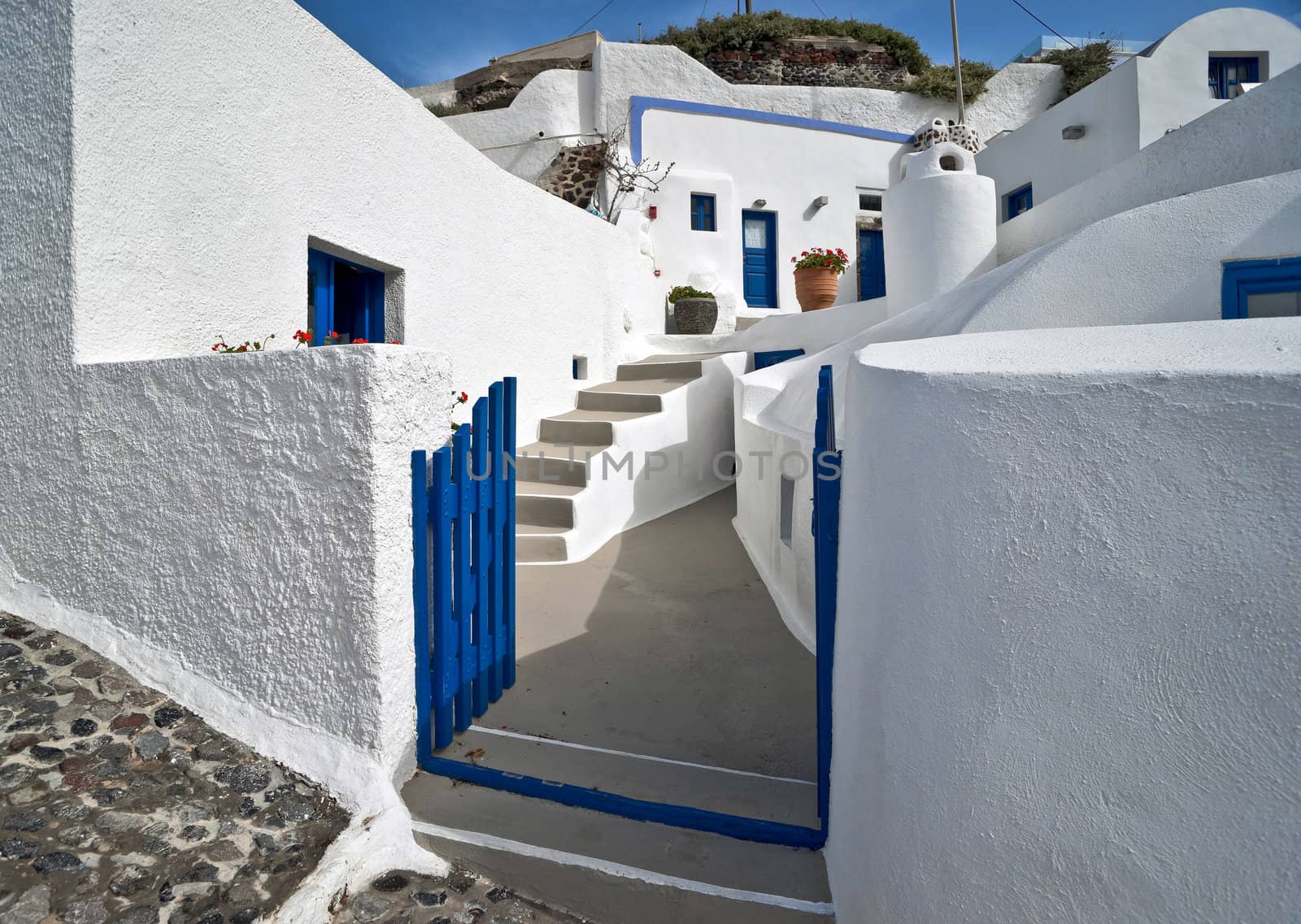 Entrance of the whitewashed house in Santorini island