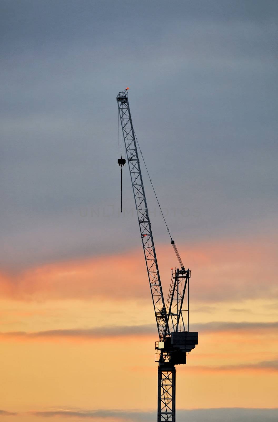 A crane silhouette at sunset