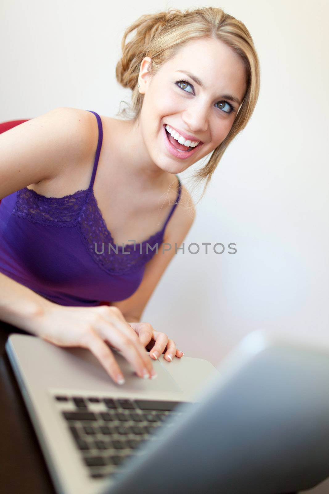 young beautiful women using a laptop by Lcrespi
