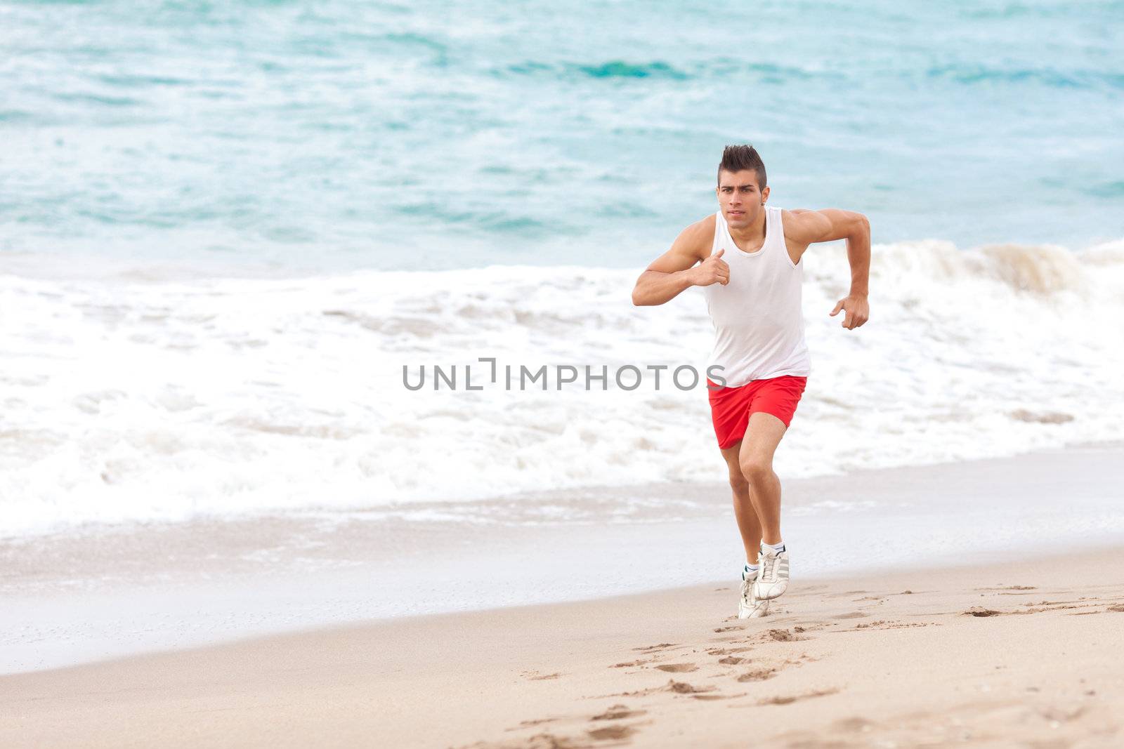 young handsome man jogging outdoors