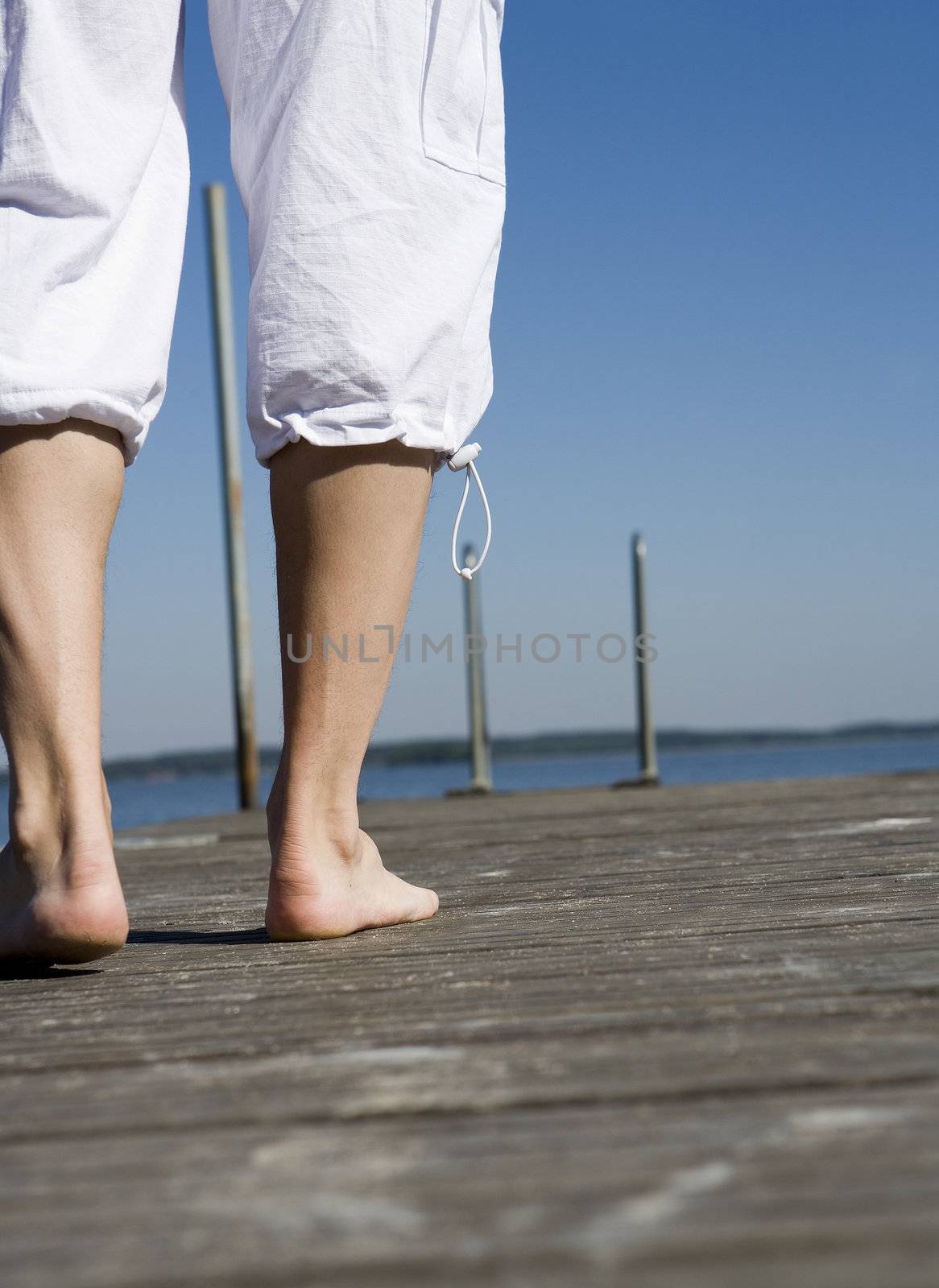 Walking barefoot on the Pier