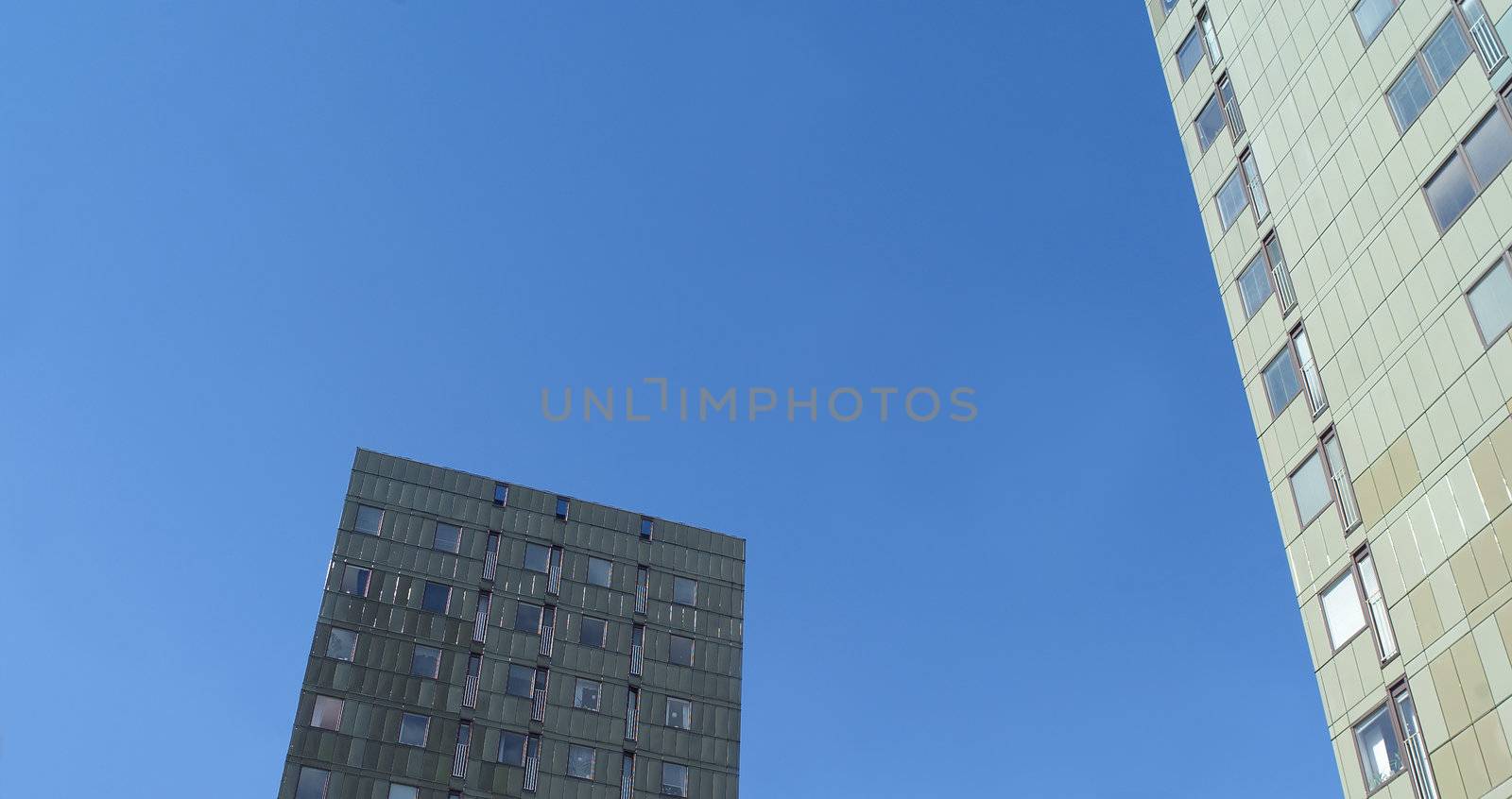 Two Skyscrapers towards blue sky