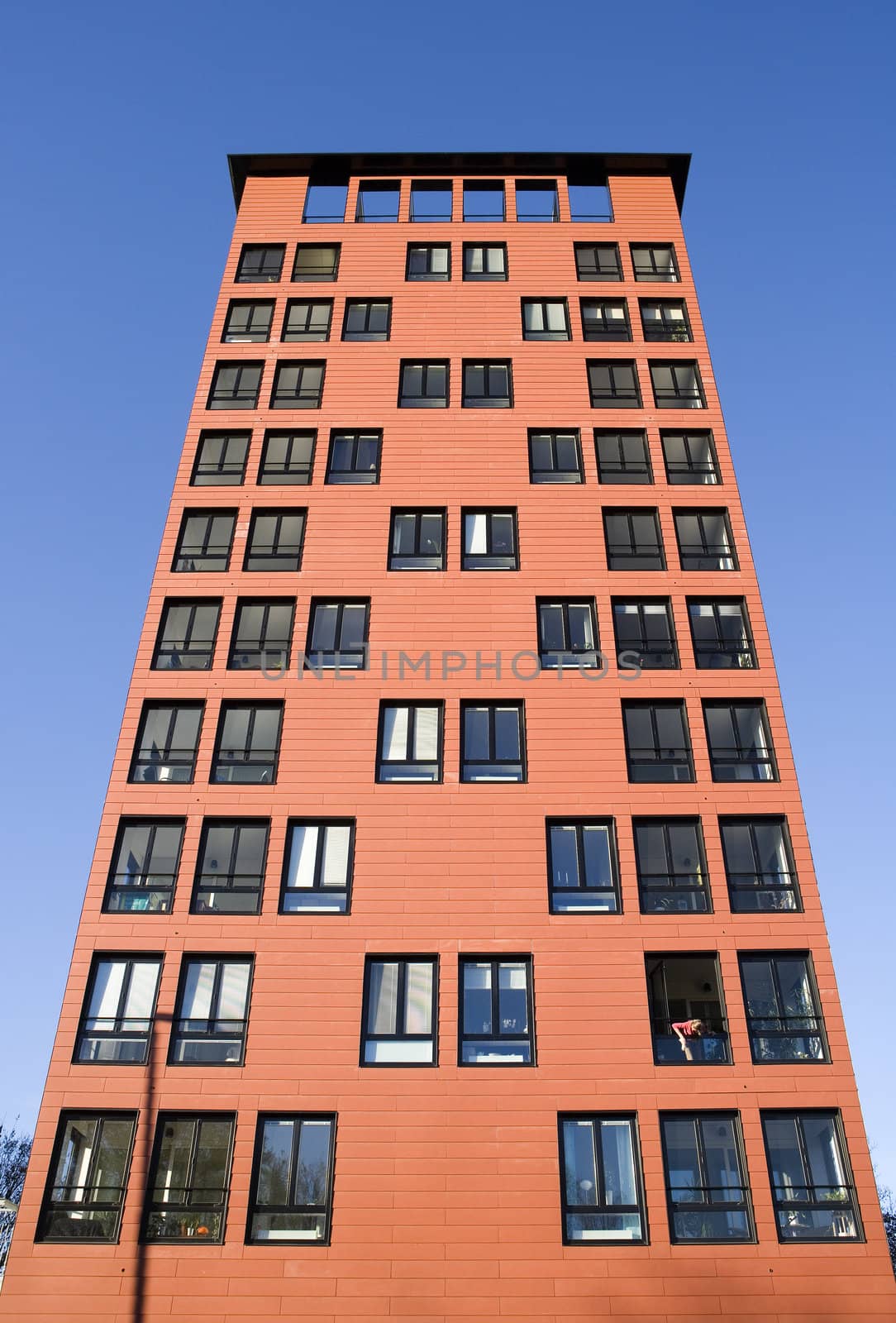 Orange Building Exterior towards Blue sky