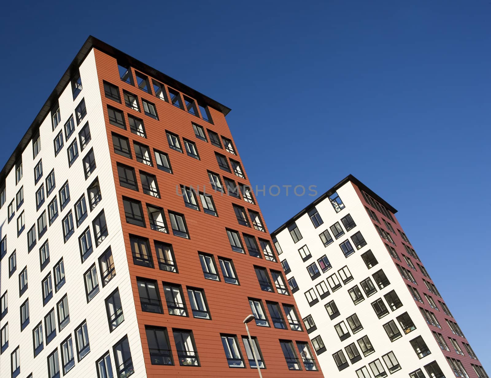 Orange Building Exterior towards Blue sky