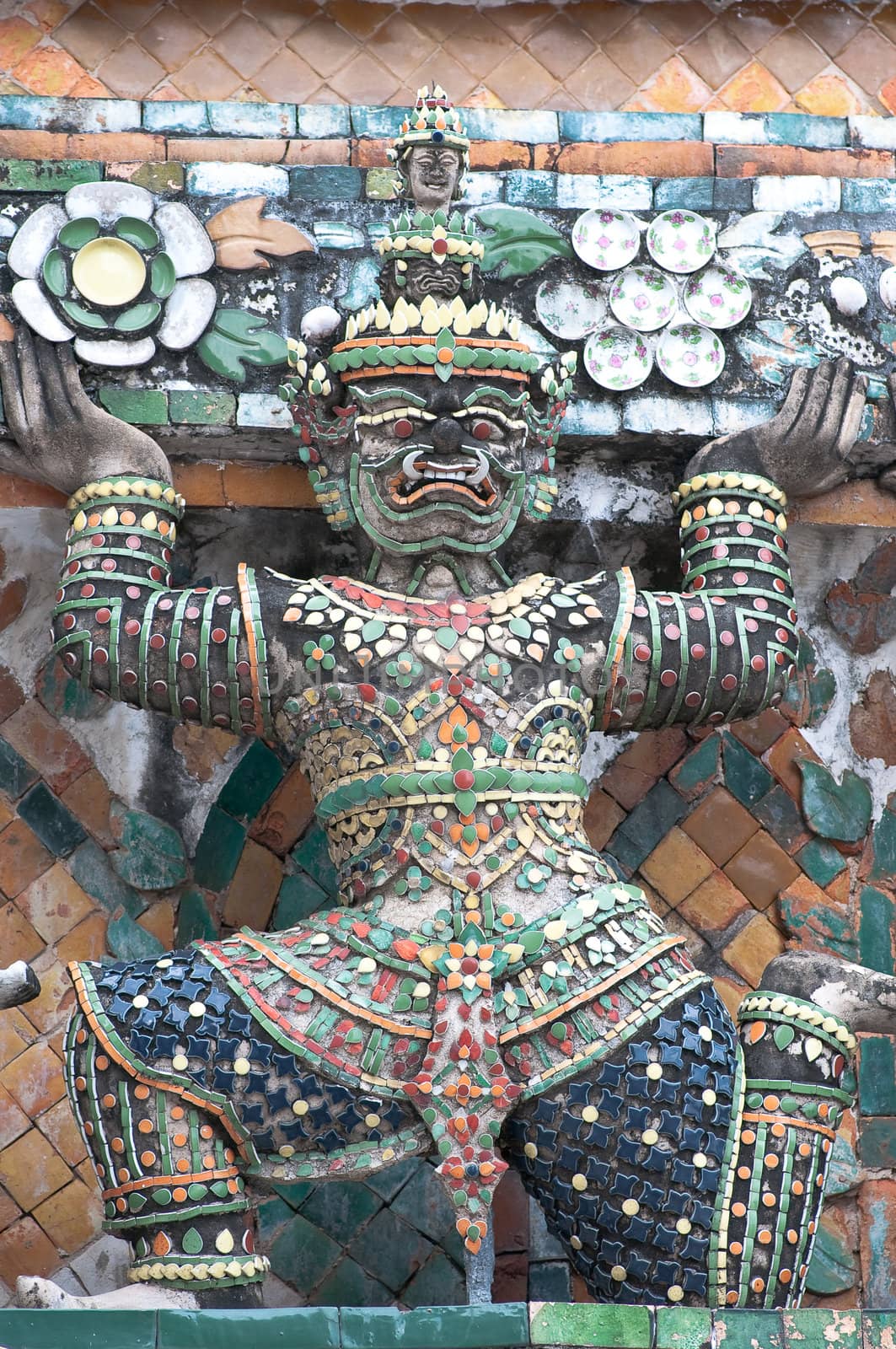 ancient demon figure in Wat Arun around pagoda, Bangkok Thailand